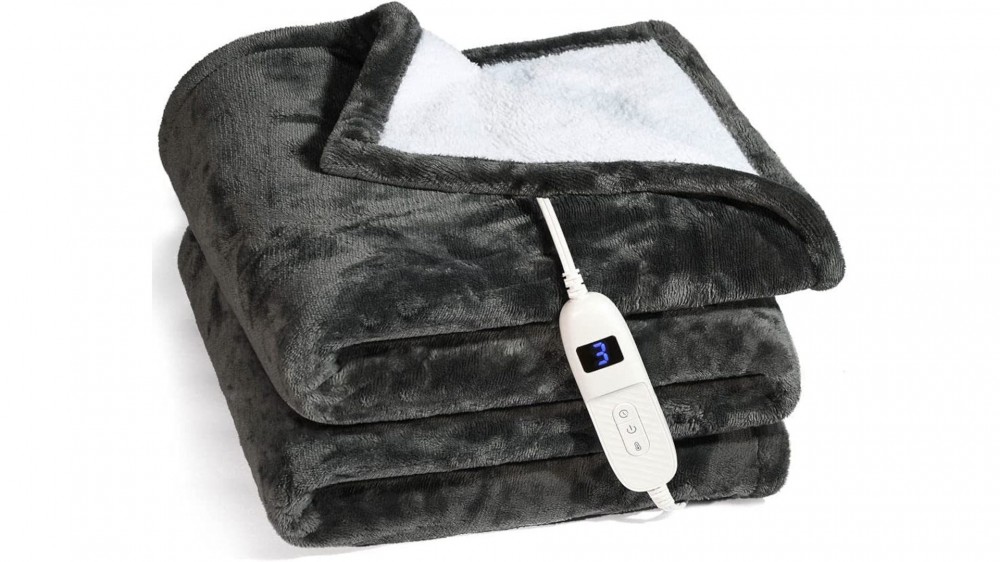 A heated blanket sits on a white background.