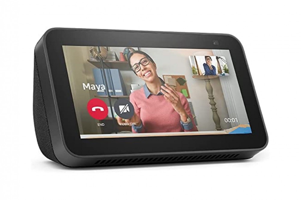 A black Echo Show 5 with the screen depicting a video call.