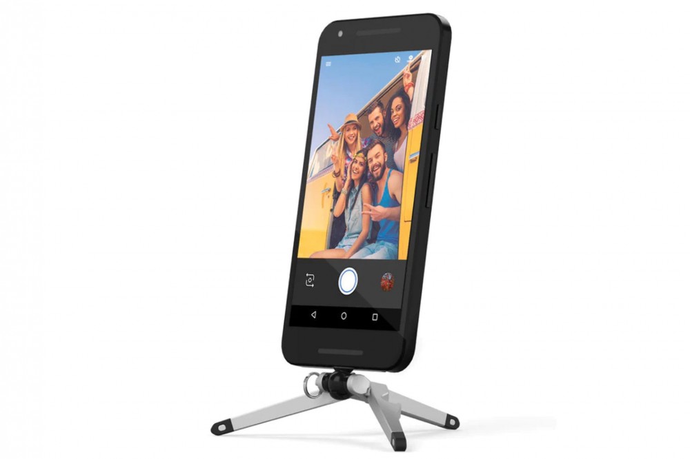 The Kenu Tripod holding a black smartphone.