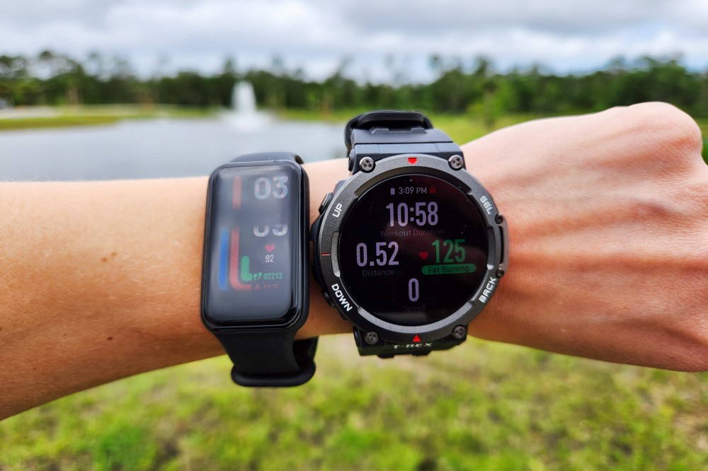 Amazfit Band 7 and Amazfit T-Rex 2 watches on a wrist